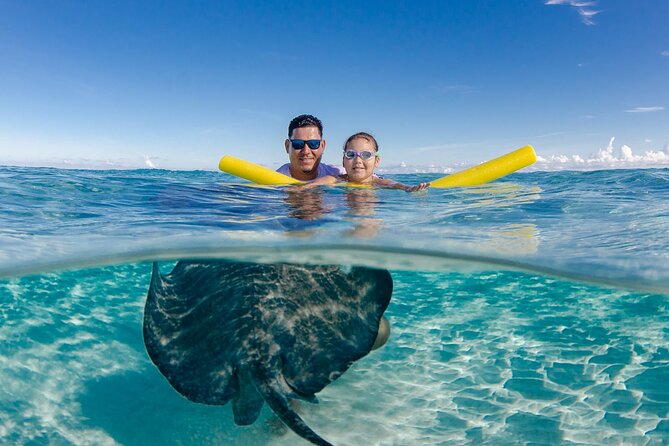 4 hour Private Boat charter to Stingray City, Snorkeling and More - The Optional Evening Bioluminescent Bay Experience