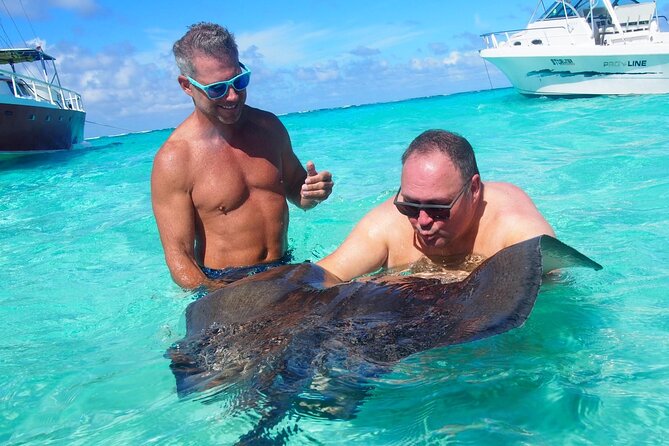 Acquarius Stingray City and Snorkel Tours - Getting there: Safehaven Marina, pickup, and cruise-day practicality