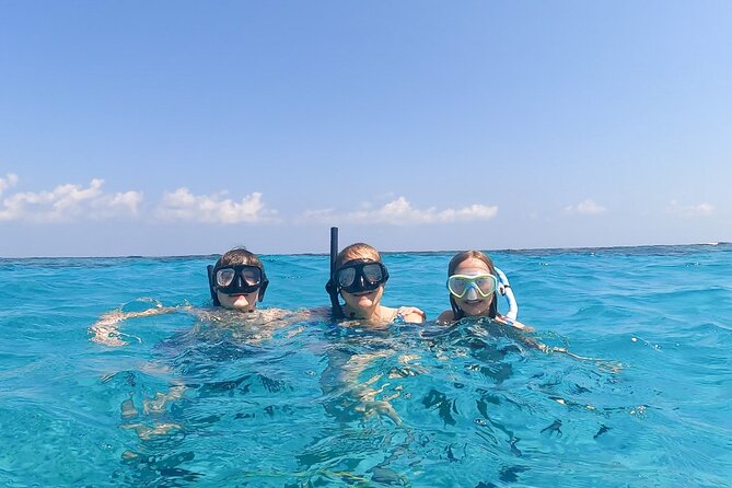 Acquarius Stingray City and Snorkel Tours - The crew effect: Jake, Alex, Brian, Jason, and Michael