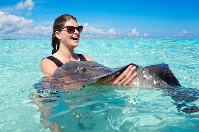 Grand Cayman Catamaran Tour to Stingray City and Rum Point - Boarding the luxury 65-foot catamaran: more than just transportation