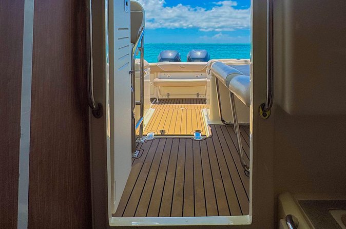 Grand Cayman Private Custom Boating Adventure - Kaibo Beach Club and Waterfront Lunch with Timing Limits