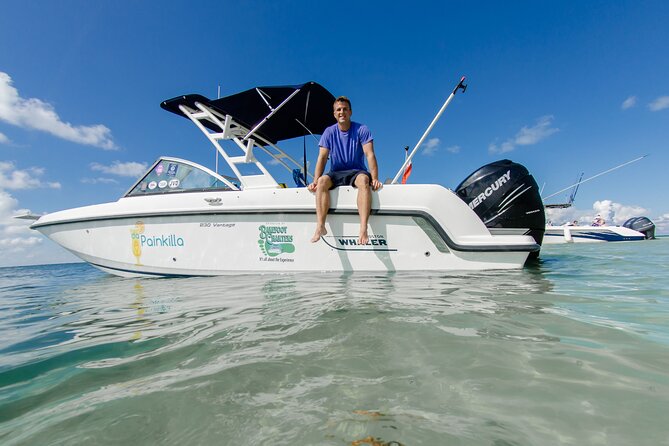 Private boat charter in Grand Cayman - Starfish Point plus snorkeling time: gear you get and pacing you control