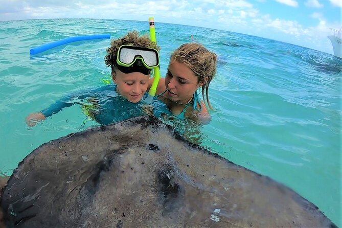 Private Charter 28ft Grady White. Stingrays, Snorkeling, Starfish - The 4-hour route: Stingray City, reef time, then Starfish Point (or a bonus stop)