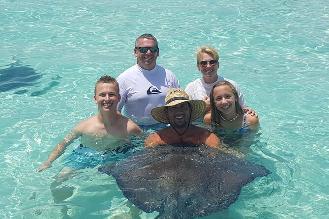Private Charter 34ft Express Cruiser Stingay City Reef Snorkeling - Stingray City: the waist-deep sandbar that turns into a hands-on moment