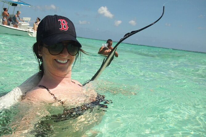 Stingray City Experience Plus Two Snorkeling Stops on Grand Cayman - Snorkeling stop 2: Barrier Reef, extra fish time, and turtle odds